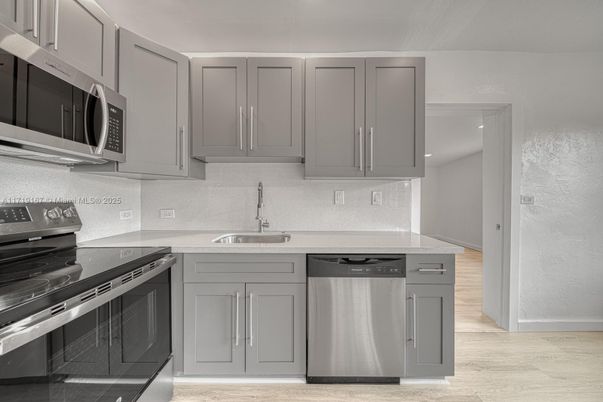 Interior, Kitchen, Recessed Lighting, Stainless Steel Appliances, Wood Texture Flooring