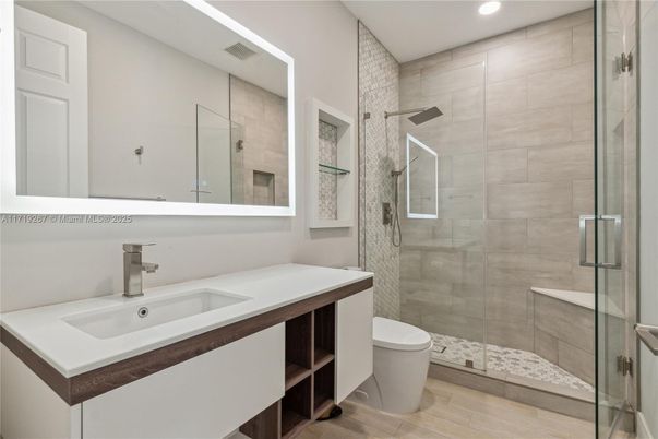 Bathroom, Glass Shower, Interior, Recessed Lighting, Wood Texture Flooring