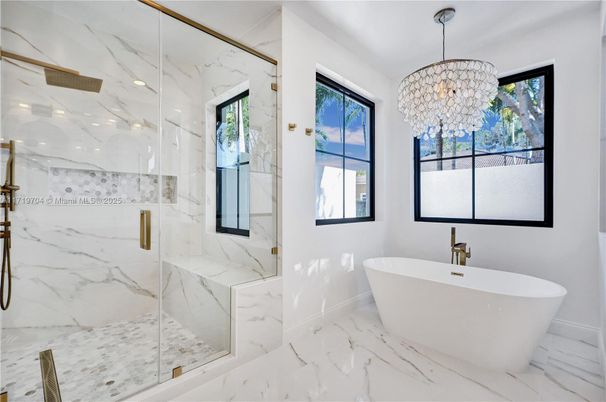 Bathroom, Chandelier, Free Standing Baths, Glass Shower, Interior, Marble, Marble Walls, Recessed Lighting