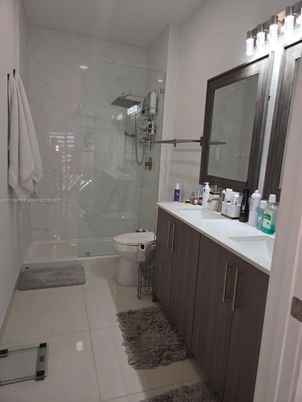 Bathroom, Dual Sink Vanities, Glass Shower, Interior, Marble Walls