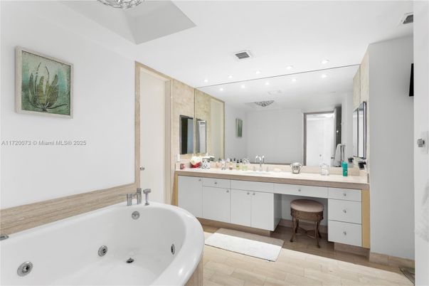 Bathroom, Dual Sink Vanities, Interior, Recessed Lighting, Wood Texture Flooring