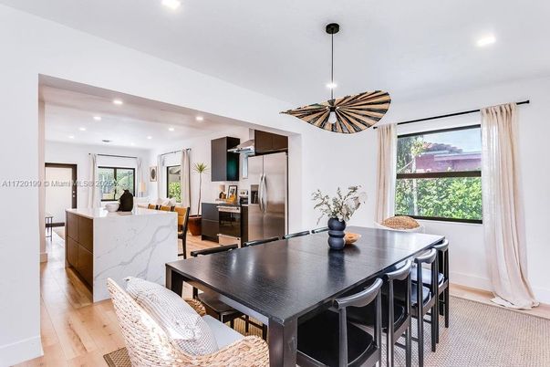 Dining room, Interior, Kitchen, Pendant Lights, Recessed Lighting, Stainless Steel Appliances, Wood Texture Flooring