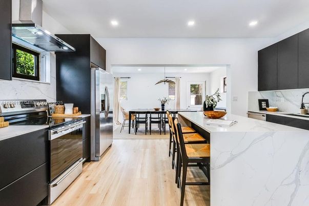 Dining room, Interior, Kitchen, Marble Walls, Pendant Lights, Recessed Lighting, Stainless Steel Appliances, Wood Texture Flooring