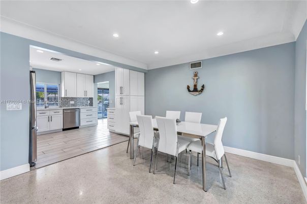 Dining room, Interior, Kitchen, Recessed Lighting, Stainless Steel Appliances, Wood Texture Flooring