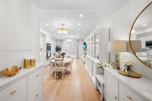 Chandelier, Dining room, Interior, Kitchen, Recessed Lighting, Stainless Steel Appliances, Wood Texture Flooring