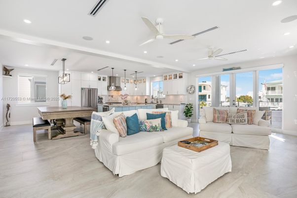 Dining room, Interior, Kitchen, Living room, Pendant Lights, Recessed Lighting, Stainless Steel Appliances, Wood Texture Flooring