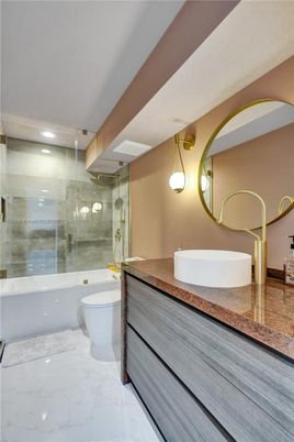 Bathroom, Dual Sink Vanities, Glass Shower, Interior, Marble, Recessed Lighting