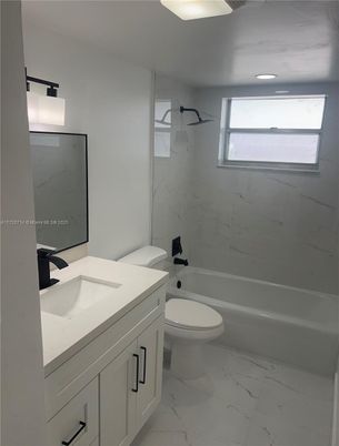 Bathroom, Dual Sink Vanities, Interior, Marble, Marble Walls, Recessed Lighting