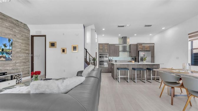 Interior, Kitchen, Living room, Pendant Lights, Recessed Lighting, Stainless Steel Appliances, Stone Walls, Wood Texture Flooring