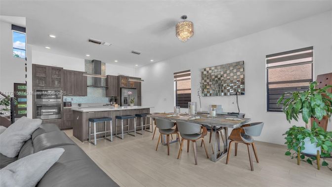 Dining room, Interior, Kitchen, Recessed Lighting, Stainless Steel Appliances, Wood Texture Flooring