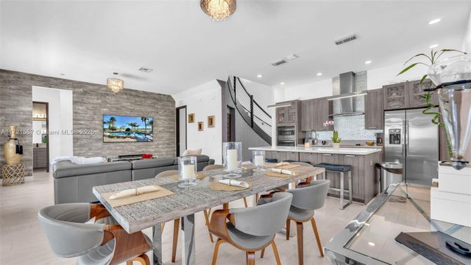 Dining room, Interior, Kitchen, Living room, Pendant Lights, Recessed Lighting, Stainless Steel Appliances, Stone Walls