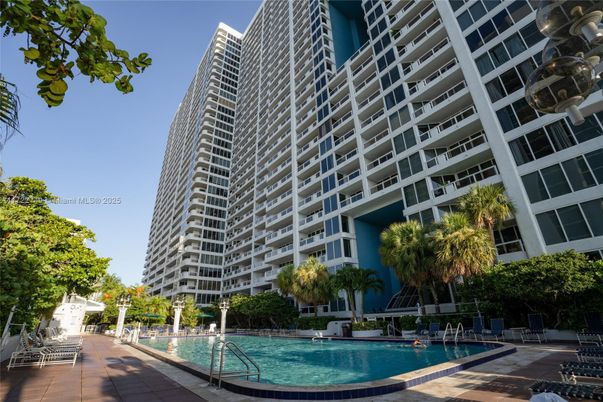 Exterior, Facade, Pool, Condo Building