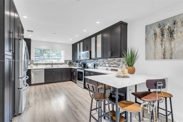 Interior, Kitchen, Recessed Lighting, Stainless Steel Appliances, Wood Texture Flooring