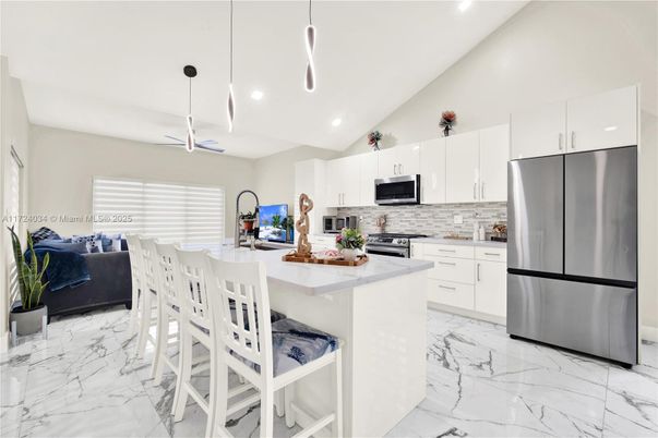 Interior, Kitchen, Marble, Pendant Lights, Recessed Lighting, Stainless Steel Appliances