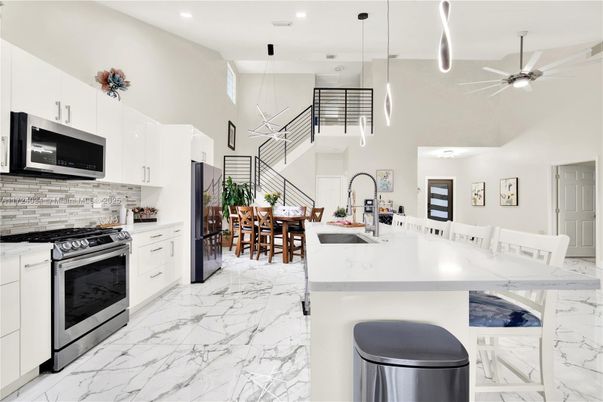 Dining room, Interior, Kitchen, Marble, Pendant Lights, Recessed Lighting, Stainless Steel Appliances