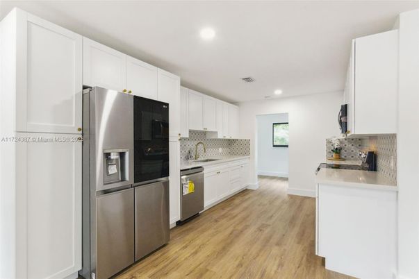 Interior, Kitchen, Recessed Lighting, Stainless Steel Appliances, Wood Texture Flooring