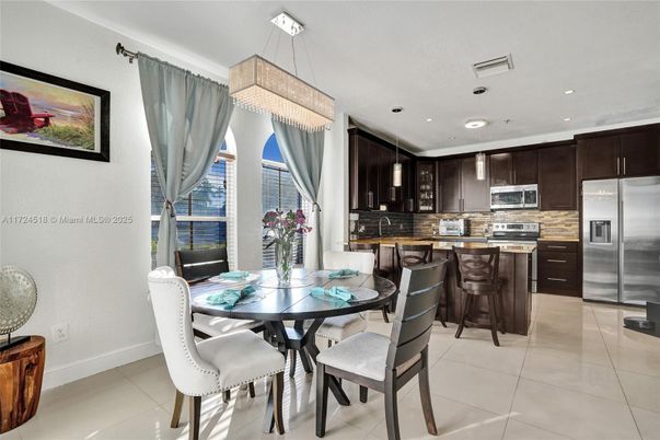 Chandelier, Dining room, Interior, Kitchen, Pendant Lights, Recessed Lighting, Stainless Steel Appliances