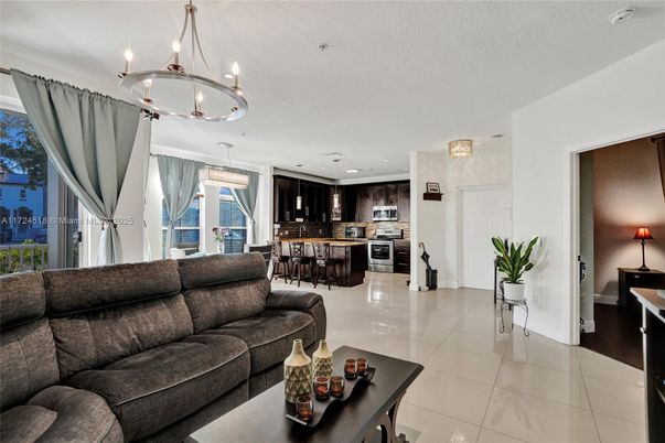 Chandelier, Dining room, Interior, Kitchen, Living room, Pendant Lights, Recessed Lighting, Stainless Steel Appliances