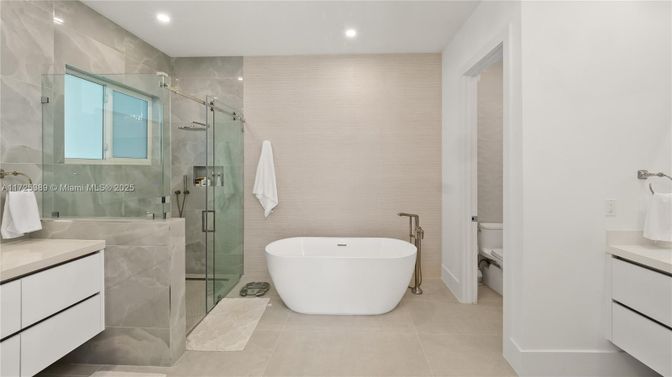 Bathroom, Free Standing Baths, Glass Shower, Interior, Recessed Lighting