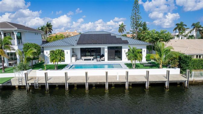 Exterior, Lake, Pool, Solar Panels