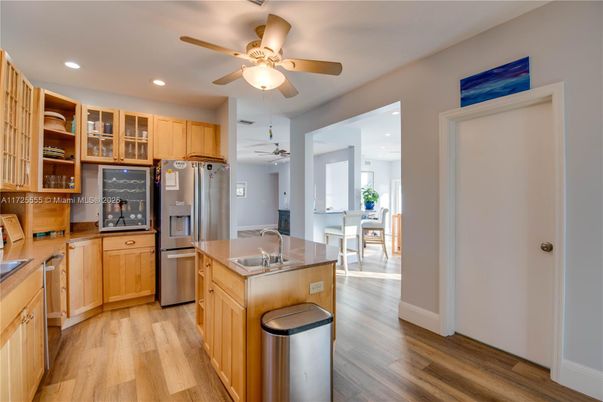 Dining room, Interior, Kitchen, Recessed Lighting, Stainless Steel Appliances, Wood Texture Flooring