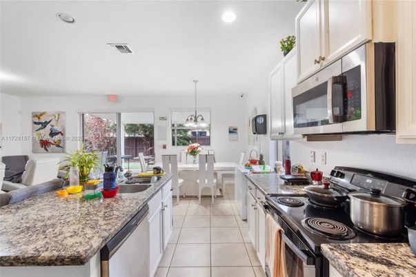 Dining room, Interior, Kitchen, Pendant Lights, Recessed Lighting, Stainless Steel Appliances