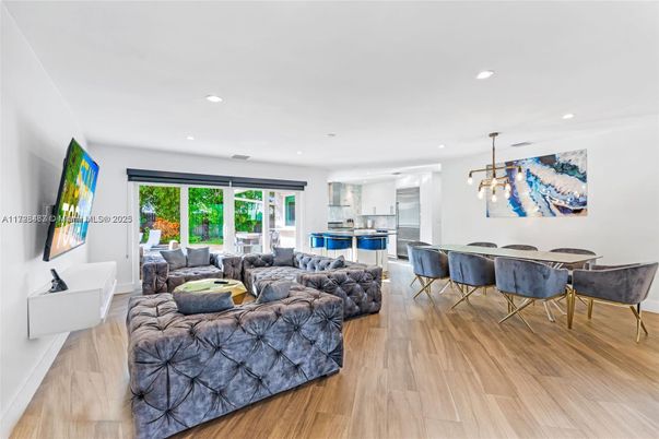 Dining room, Interior, Kitchen, Living room, Pendant Lights, Recessed Lighting, Stainless Steel Appliances, Wood Texture Flooring