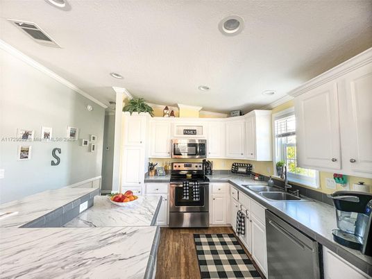 Interior, Kitchen, Marble, Recessed Lighting, Stainless Steel Appliances, Wood Texture Flooring
