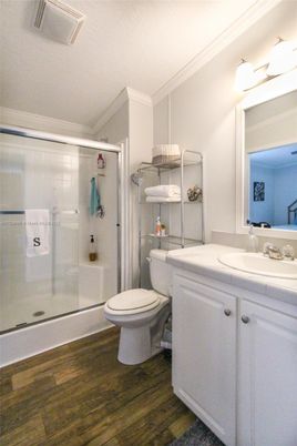 Bathroom, Glass Shower, Interior, Tile Countertops, Wood Texture Flooring
