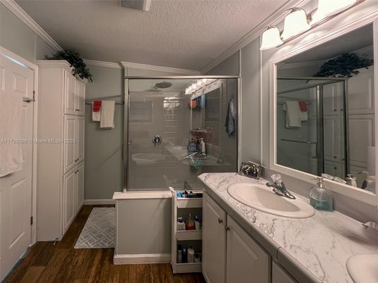 Bathroom, Dual Sink Vanities, Glass Shower, Interior, Wood Texture Flooring
