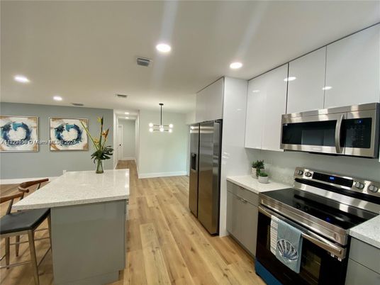 Interior, Kitchen, Pendant Lights, Recessed Lighting, Stainless Steel Appliances, Wood Texture Flooring