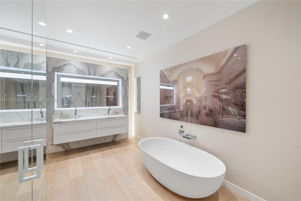 Bathroom, Free Standing Baths, Glass Shower, Interior, Marble Walls, Recessed Lighting, Wood Texture Flooring