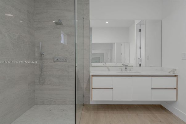 Bathroom, Glass Shower, Interior, Marble Walls, Recessed Lighting, Wood Texture Flooring