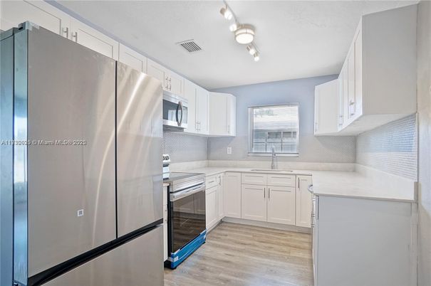 Interior, Kitchen, Stainless Steel Appliances, Wood Texture Flooring