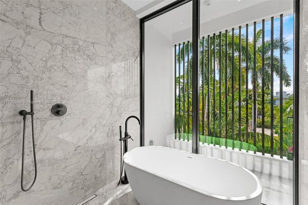 Bathroom, Free Standing Baths, Glass Shower, Interior, Marble Walls, Recessed Lighting