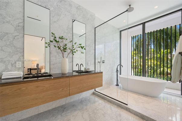 Bathroom, Dual Sink Vanities, Free Standing Baths, Glass Shower, Interior, Marble, Marble Walls, Recessed Lighting