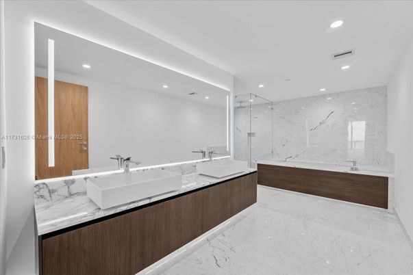 Bathroom, Dual Sink Vanities, Glass Shower, Interior, Marble, Marble Walls, Recessed Lighting