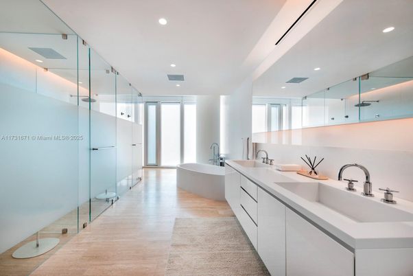 Bathroom, Dual Sink Vanities, Free Standing Baths, Glass Shower, Interior, Recessed Lighting, Wood Texture Flooring