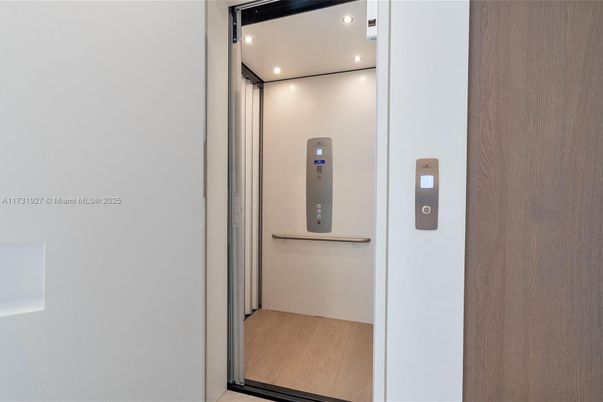 Elevator, Interior, Recessed Lighting, Wood Texture Flooring
