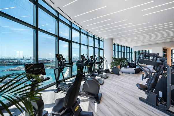Fitness Equipment, Gym, Interior, Recessed Lighting, Water, Wood Texture Flooring