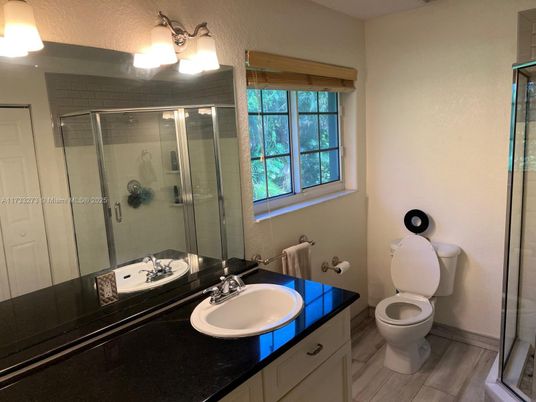 Bathroom, Dual Sink Vanities, Glass Shower, Interior, Wood Texture Flooring