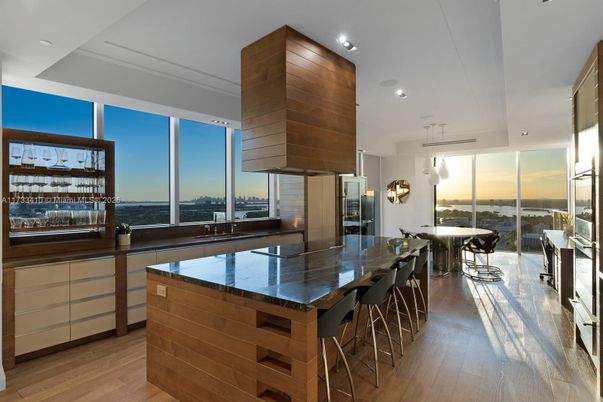 Dining room, Interior, Kitchen, Pendant Lights, Recessed Lighting, Stainless Steel Appliances, Water, Wood Texture Flooring