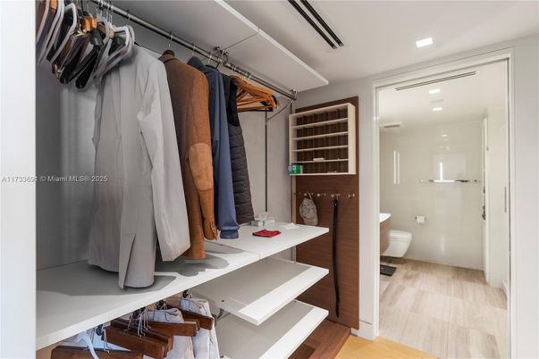 Bathroom, Glass Shower, Interior, Recessed Lighting, Walk-in Closets, Wood Texture Flooring