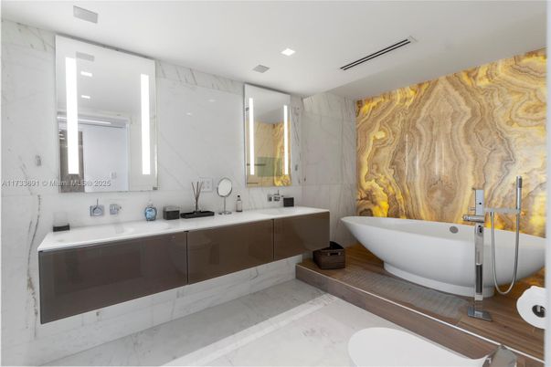 Bathroom, Dual Sink Vanities, Free Standing Baths, Interior, Marble, Marble Walls, Recessed Lighting