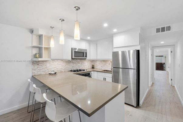 Interior, Kitchen, Pendant Lights, Recessed Lighting, Stainless Steel Appliances, Wood Texture Flooring