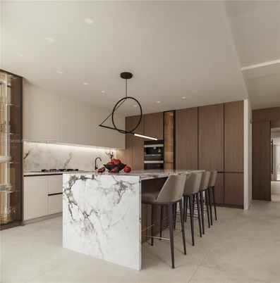 Interior, Kitchen, Marble Walls, Pendant Lights, Recessed Lighting, Stainless Steel Appliances