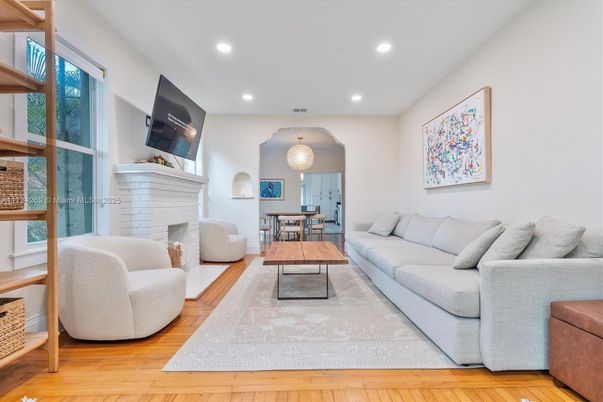 Dining room, Fireplace, Interior, Living room, Pendant Lights, Recessed Lighting, Wood Texture Flooring