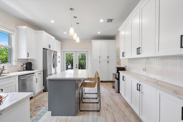 Interior, Kitchen, Pendant Lights, Recessed Lighting, Stainless Steel Appliances, Wood Texture Flooring