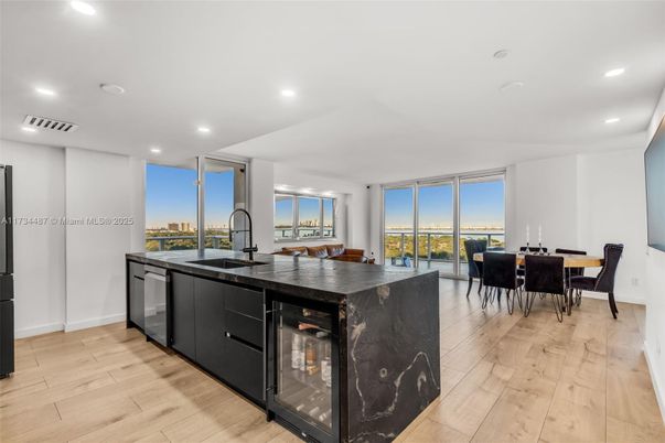 Dining room, Interior, Kitchen, Recessed Lighting, Stainless Steel Appliances, Wood Texture Flooring