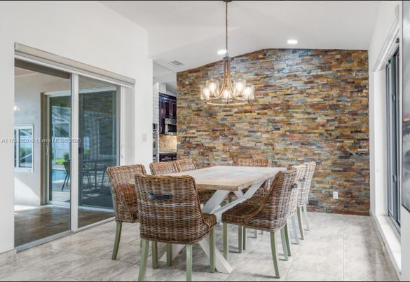 Chandelier, Dining room, Interior, Pendant Lights, Recessed Lighting, Stone Walls